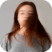 A woman with long hair.