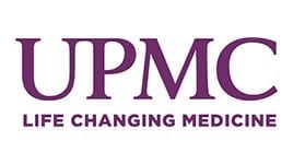 UPMC logo in purple letters with the tagline “Life Changing Medicine” written below in all capital letters.